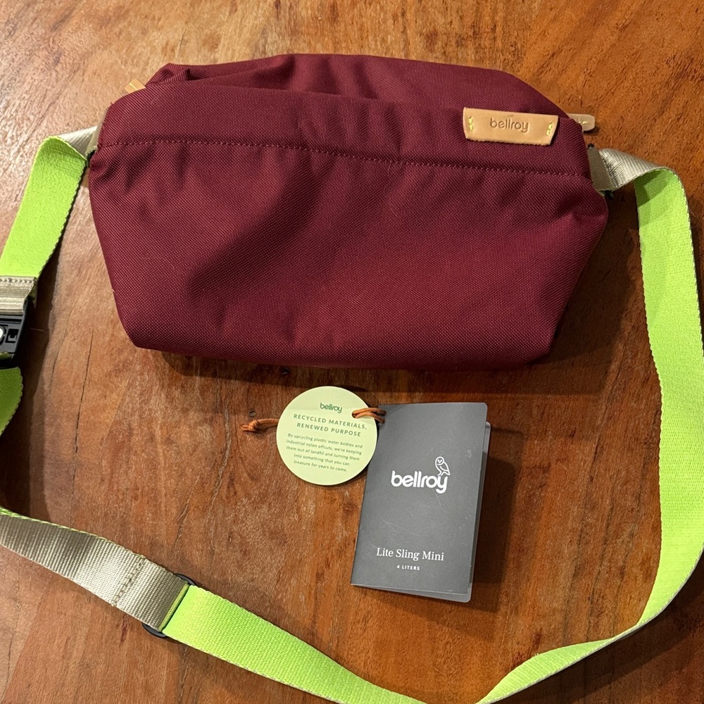 Bellroy Lite Sling Mini in Maroon and Neon Green; like new condition.